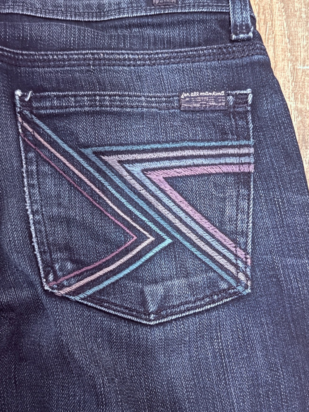 7 For All Mankind Dark Blue Boot Cut Jeans with Multicolor Back Pocket Stitching